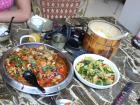 Spicy beer fish and a bucket of rice in Yangshuo
