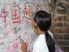 This board at the Great Wall has messages from all around the world
