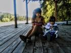 Flor and her niece, Almendra, and Nalá on the dock