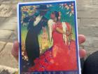 Here's an example of what traditional flamenco dress looks like, as shown on this postcard