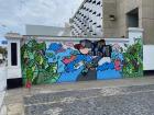 Mural shows a student in a school uniform