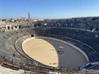 The arena of the nearby town, Nîmes, where they also have a yearly Feria