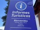 A quadrilingual sign at the Esquel tourism office, welcoming visitors to the city in Spanish, Mapuzugun, Welsh and English