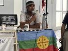 A Mapuche community leader speaks at the 2023 No a la Mina anniversary events