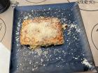 A plate of παστίτσιο (pastitsio) topped with cheese, which made for a nice addition. 
