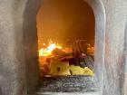 Burning joss paper as an offering for the ancestors at Kosanen Fude Temple