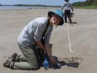 Collecting our sand samples to bring back to the lab and analyze for microplastics