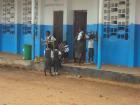 In Liberia, taking chairs to class