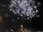 A big firework bursts over downtown Ísafjörður