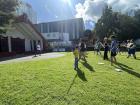 My son out with the tane [men] using a taiaha [a traditional weapon Māori] used during kapa haka