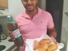 My friend, Weverton, after making pastels with a popular Brazilian soda pop