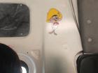 Some drivers put little decorations like this sticker inside their buses