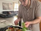 Cooking pesto chicken for my uncle and cousins