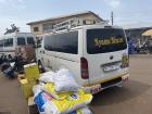 A white tro-tro in Tamale with the Twi word 'Nyame' (God) on the window