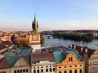 Along the Vltava River in Prague at sunset--the city is full of musical performers, delicious desserts and gorgeous medieval architecture with a modern twist