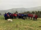 Visiting an indigenous community planning to implement an irrigation project--some very kind community members lent me their hat in the rain!