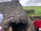 A traditional highland home--the roof is made of a thick grass which keeps the home's interior warm; most modern houses are built with concrete walls today
