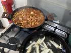 Beans are cooked separately and are often accompanied by additional sides!