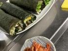 A special sushi roll called "Futomaki"-- this one had egg, rice, pork, cucumber and daikon