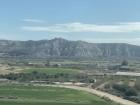 My train ride from Zaragoza to Barcelona includes traveling through this rural landscape where farms and small towns can be found in between the mountains
