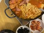 Budae Jjigae (Army Stew) is a delicious Korean hot pot dish that originates from times of war