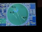 This is the ship radar that shows plotting marks (white dots) tracking three icebergs