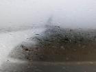 Rain and fog outside the airplane window