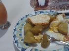 Viveres for dinner -- boiled batata (a type of sweet potato) with fried eggs