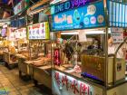 Night markets, like this one in Shilin, have many food options