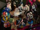 A group of catrina dolls on the street