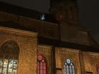 Buildings, including St. Peter's Church in Riga, change their interior lights to crimson and white this week, too!