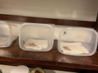 The spiders are kept in these containers for a few days at a time for inducing stress during fly development 