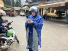 Typical outfit to ride a motorbike during the rainy season