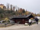 The building with rocks on the roof!