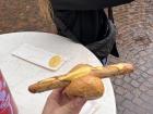A Würstschen (little sausage with an even smaller bun!) with mustard on top!