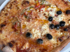 Freshly baked pizza, straight out of the brick oven!