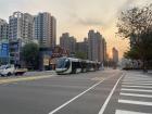 Kaohsiung Light Rail train traveling through an intersection