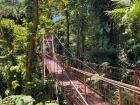 A long, red hanging bridge