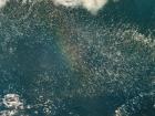 A rainbow from sea spray!