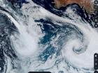 The storm system that passed yesterday is on the right of the white circle, which is our ship's location. The storm system coming in tomorrow is on the left of the white circle