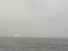 View of iceberg from the port hole of the ship!