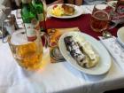 The dinner cars on trains serve great food in Europe. Here, I have German pancakes and a beer.
