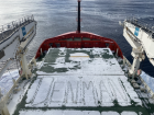 Carving DENMAN into the snow on the bow!