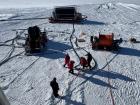 The hose reel must be quickly moved from one hole location to the next (Albrecht Karle, IceCube/NSF)