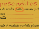 Here is a menu of a restaurant I went to, and here it is saying that the fish dishes come with a bed of greens, avocados, tomatoes and mushrooms