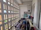 The washer and drying rack in my apartment! I can't imagine ever needing a drying machine again. For emergencies, I resorted to using a hair dryer to dry an article of clothing or two.