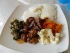Papa, moroho, potato salad and meat is a common meal for Sunday after church