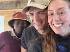 Moepi with Peace Corps volunteers at his school