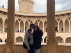 My sister and I posing at the beautiful Bellver Castle in Mallorca