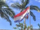 The national flag of Paraguay, the only one in the world with a different design on each side